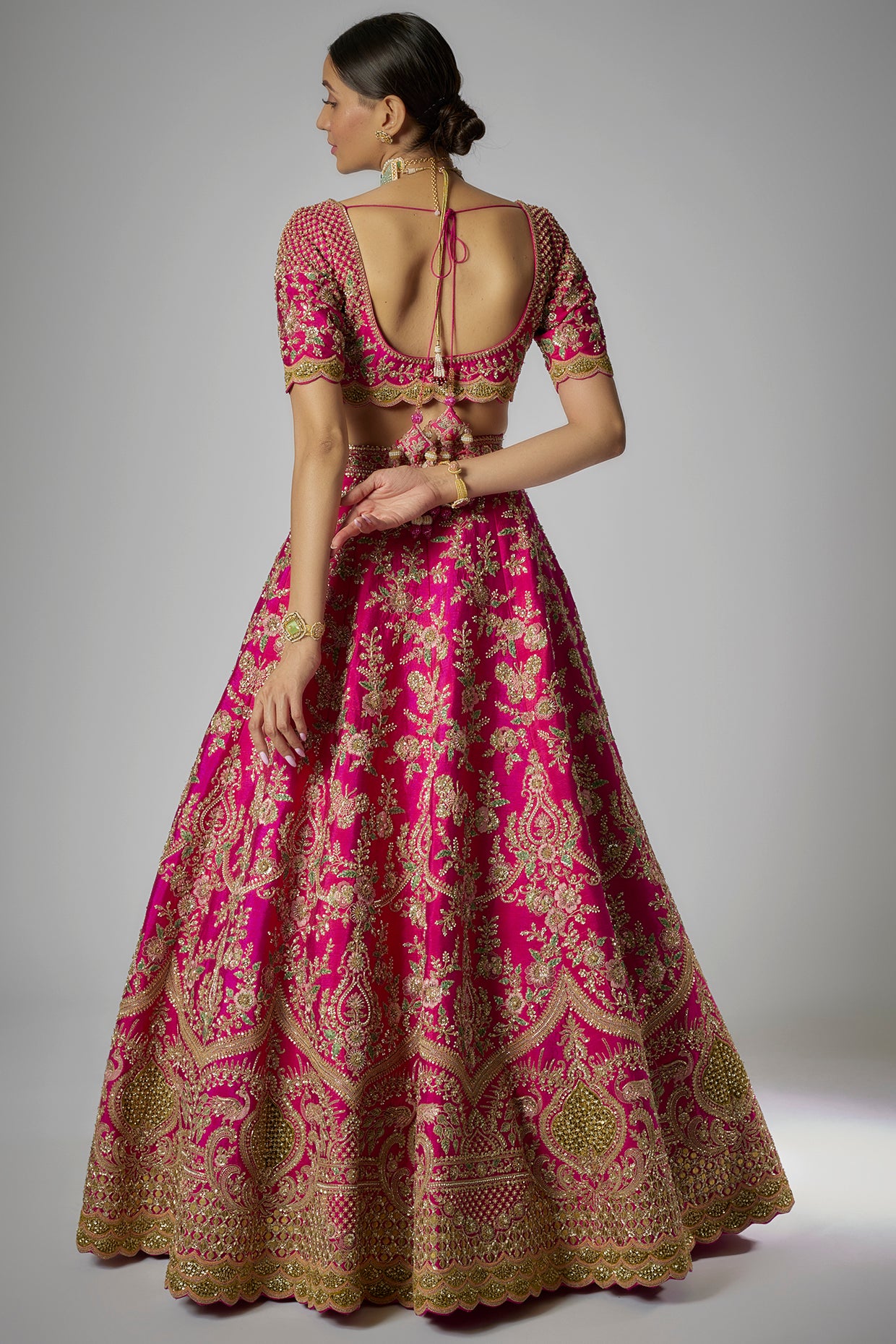 rani pink raw silk embroidered lehenga set