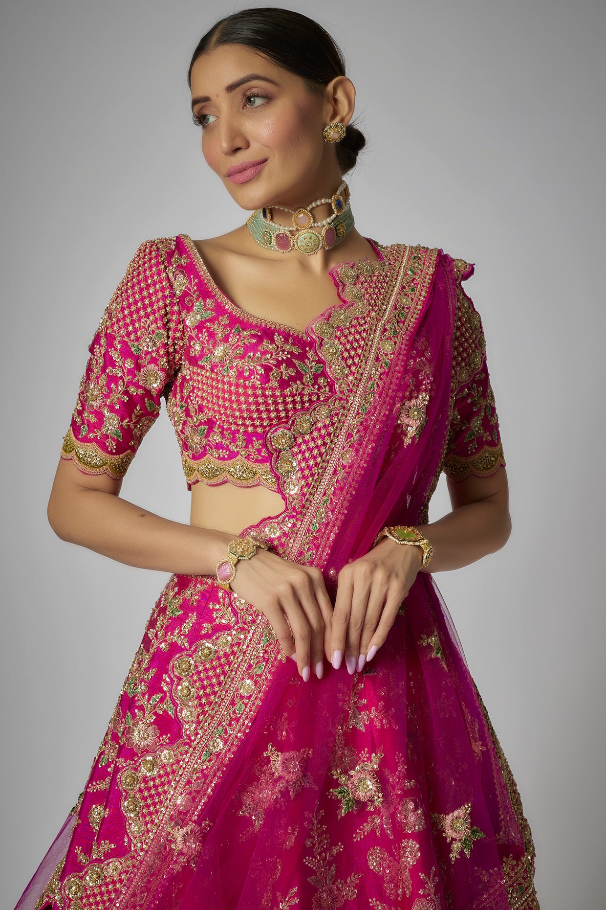 rani pink raw silk embroidered lehenga set