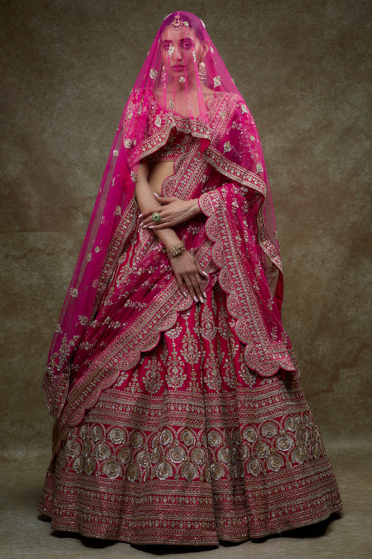 Rani pink raw silk embroidered lehenga set