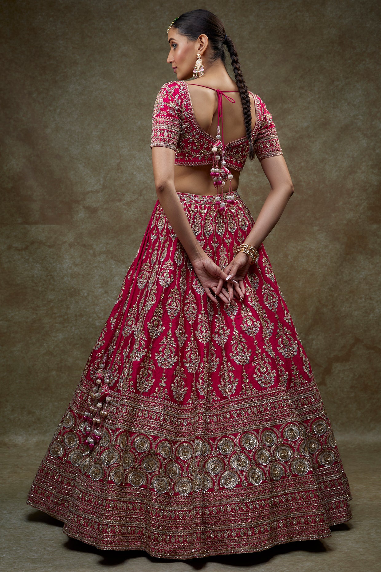 Rani pink raw silk embroidered lehenga set