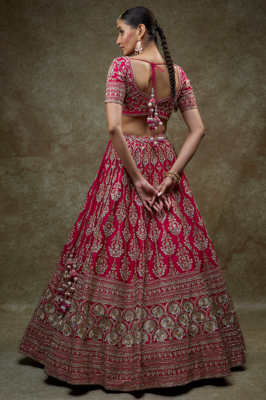 Rani pink raw silk embroidered lehenga set
