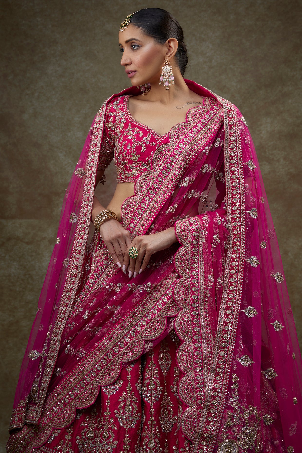 Rani pink raw silk embroidered lehenga set