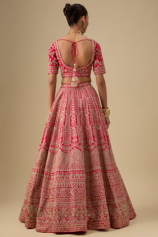rani pink raw silk hand & machine embroidered lehenga set