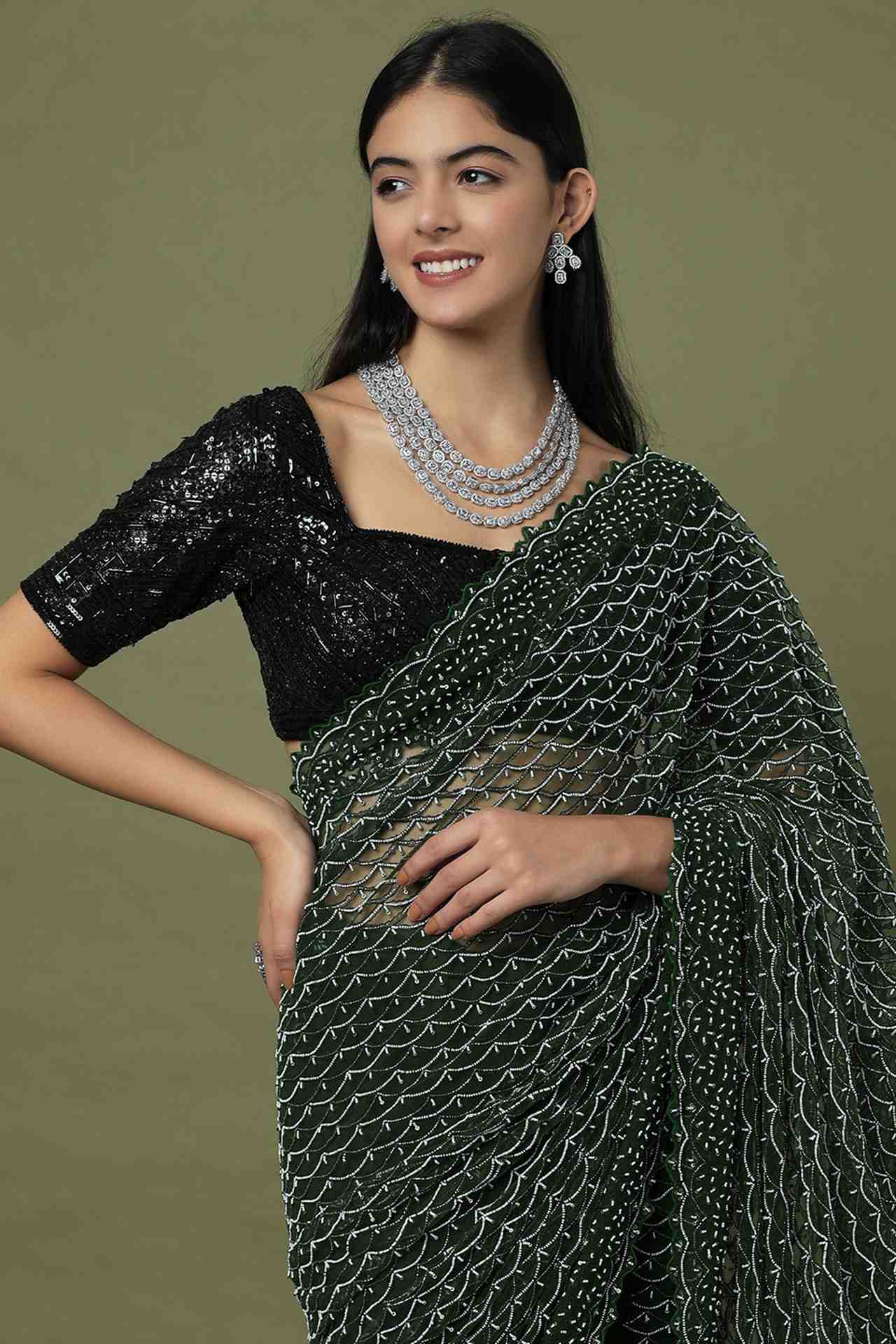dark green embroidered saree set