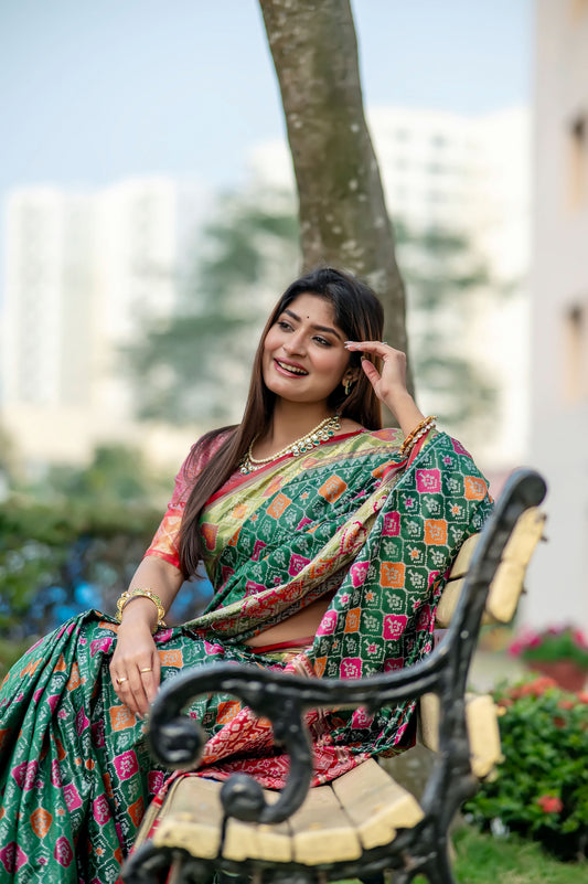 Krina Green Banarasi Silk meenakari patola weaves Saree