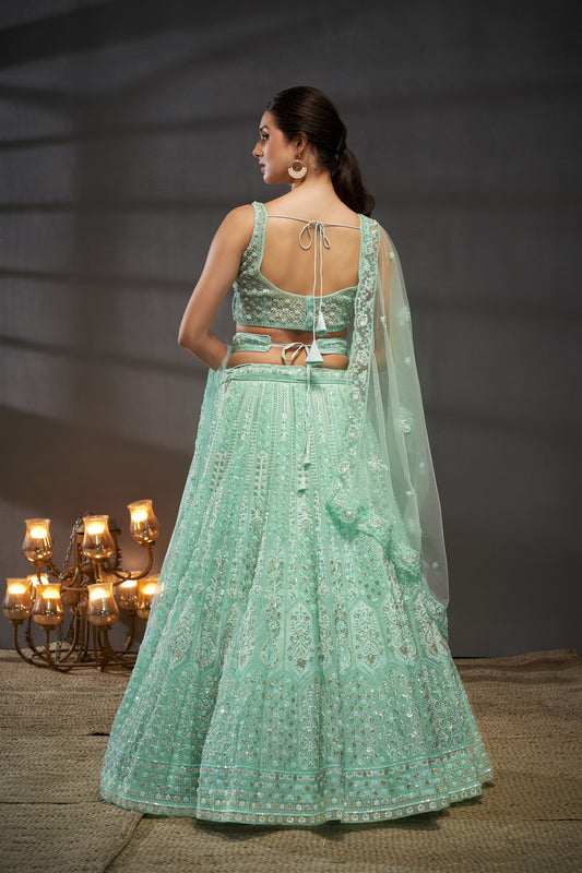 Turquoise blue Net Cutdana, Sequins and Zarkan embroidery Lehenga