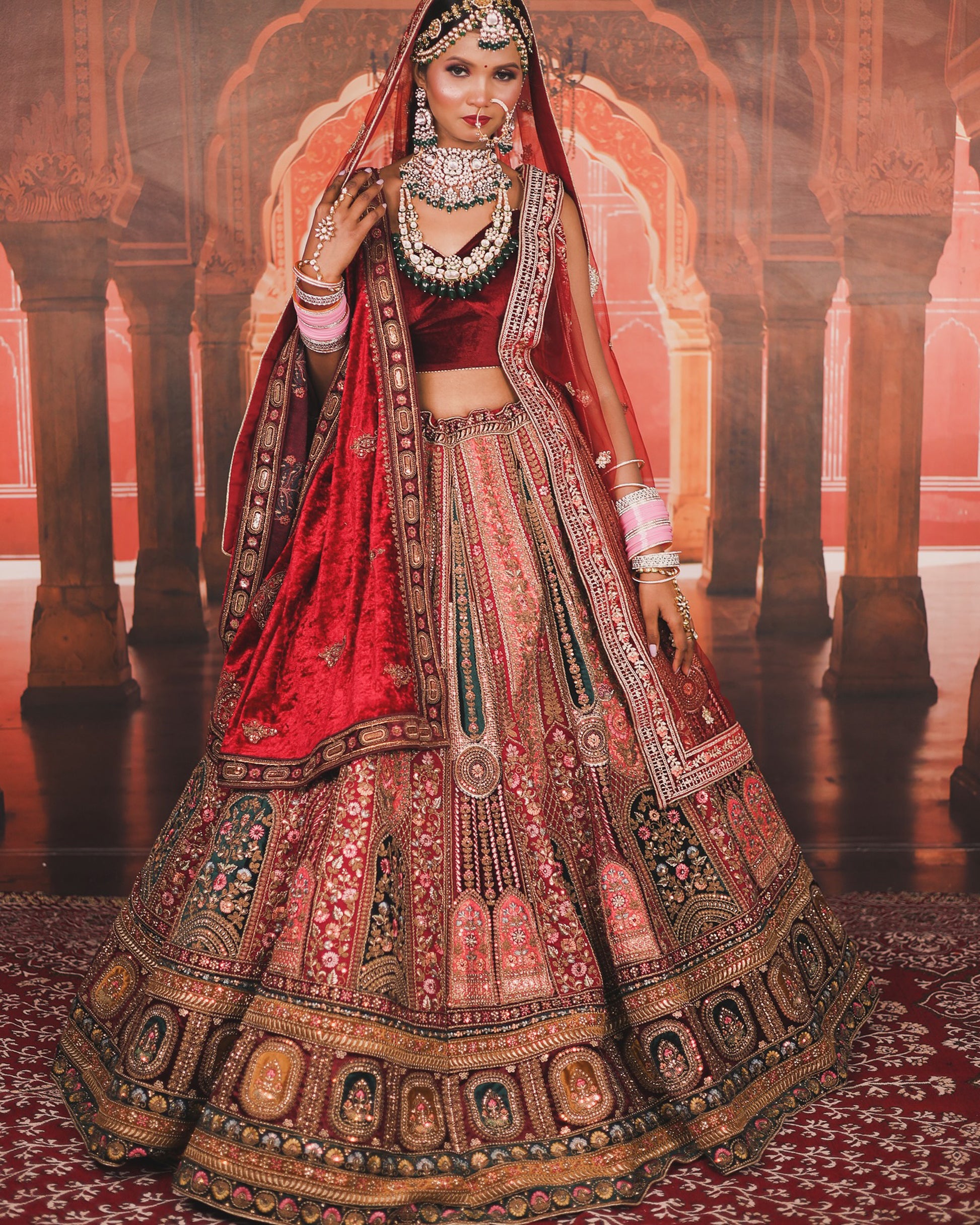 Maroon Micro velvet Zari embroidered heavy bridal lehenga