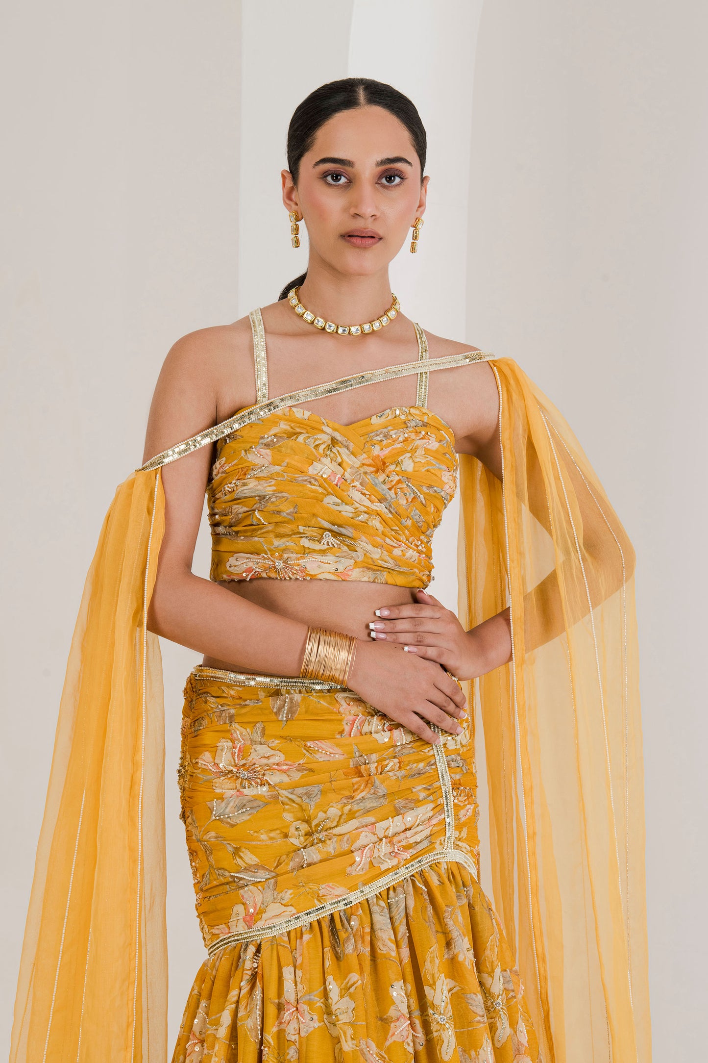 Yellow print draped embroidered lehenga set