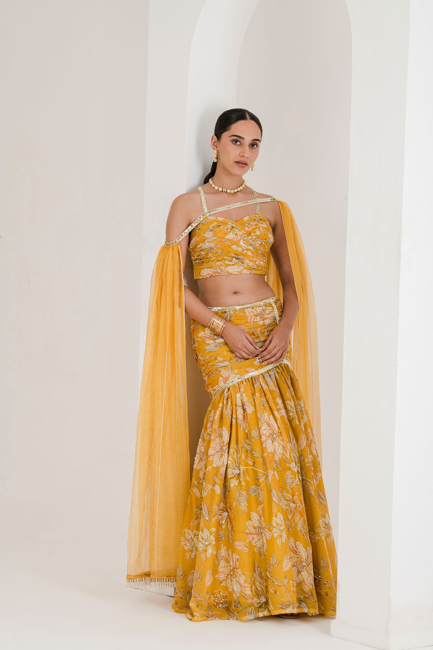 Yellow print draped embroidered lehenga set