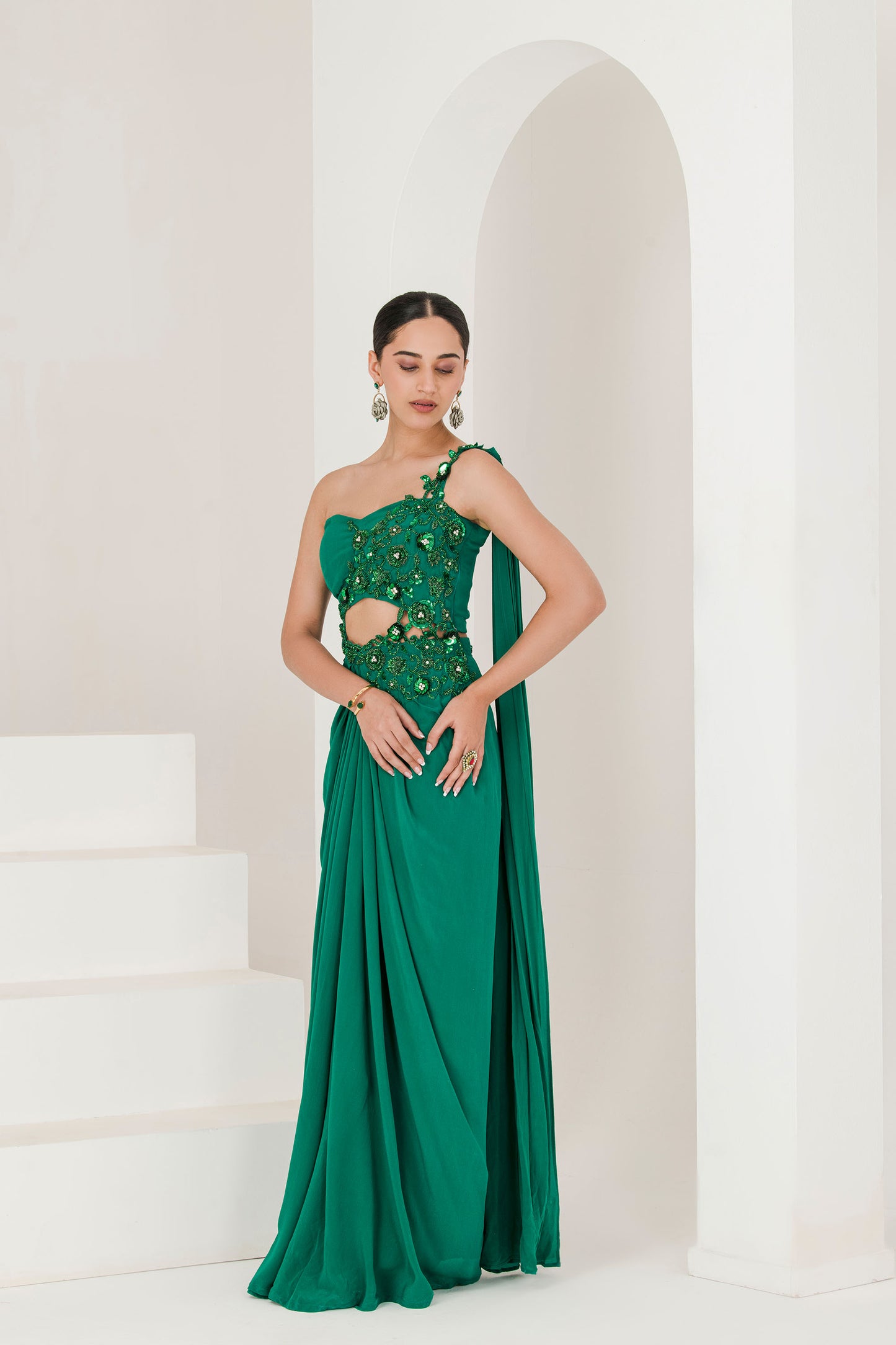 Green crepe hand embroidered pre stitched saree