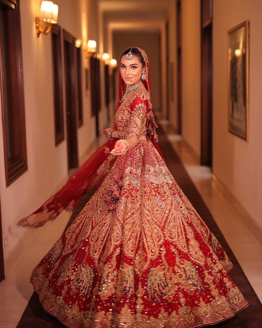 Passionate Red Sequins Embroidered Bridal Lehenga Set With Zari &Cut Dana in Raw Silk