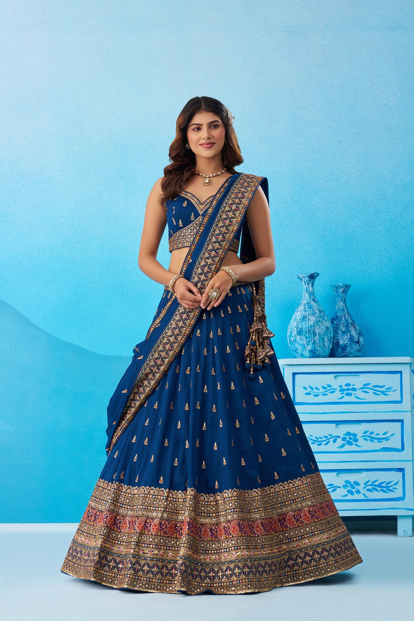 Teal Blue Chinnon Silk Sequins, Thread & Zari Embroidered Lehenga Choli