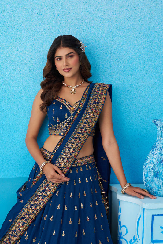 Teal Blue Chinnon Silk Sequins, Thread & Zari Embroidered Lehenga Choli