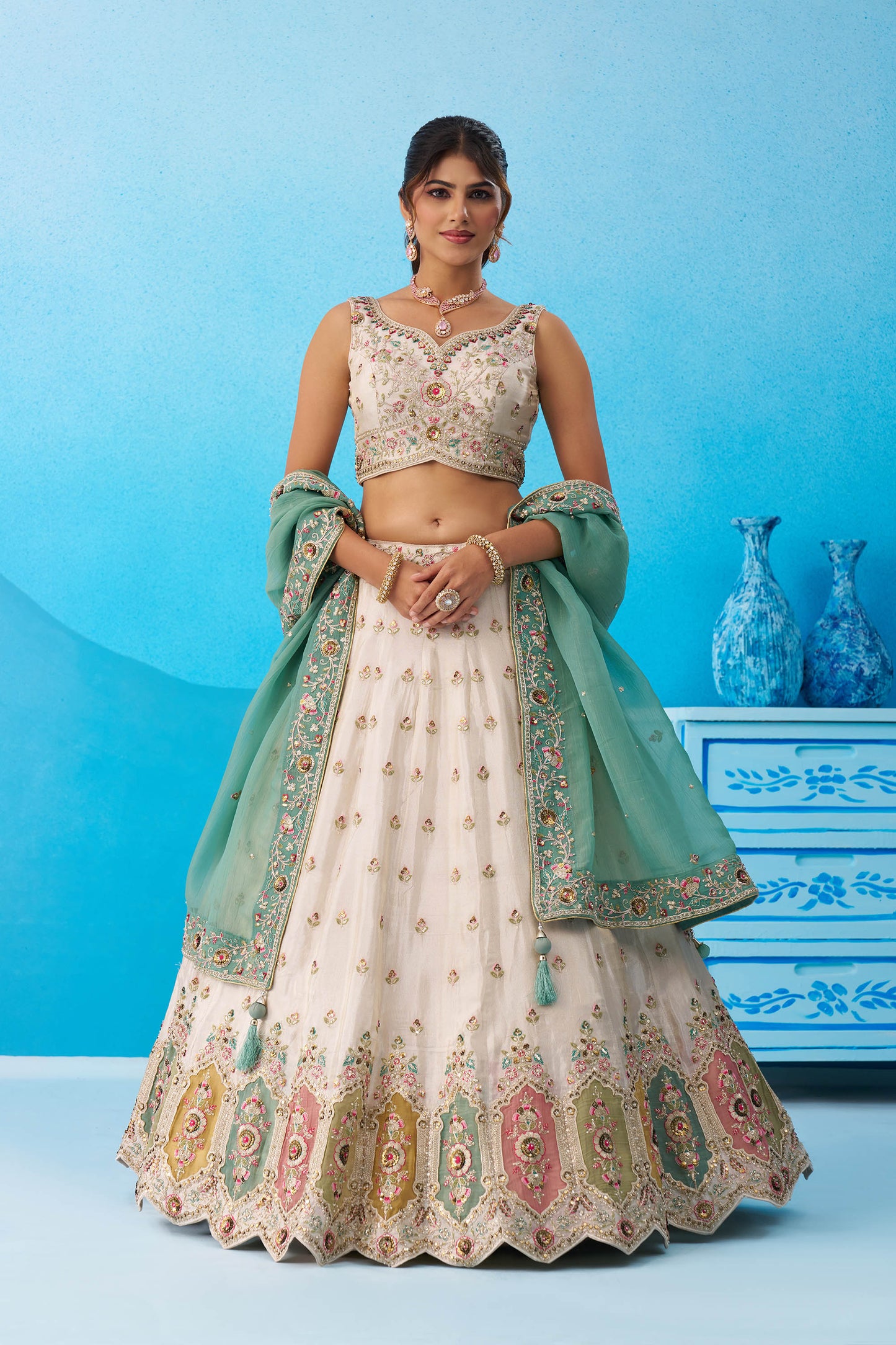 Cream & Sea Green Tissue Sequins Embroidered Lehenga Choli