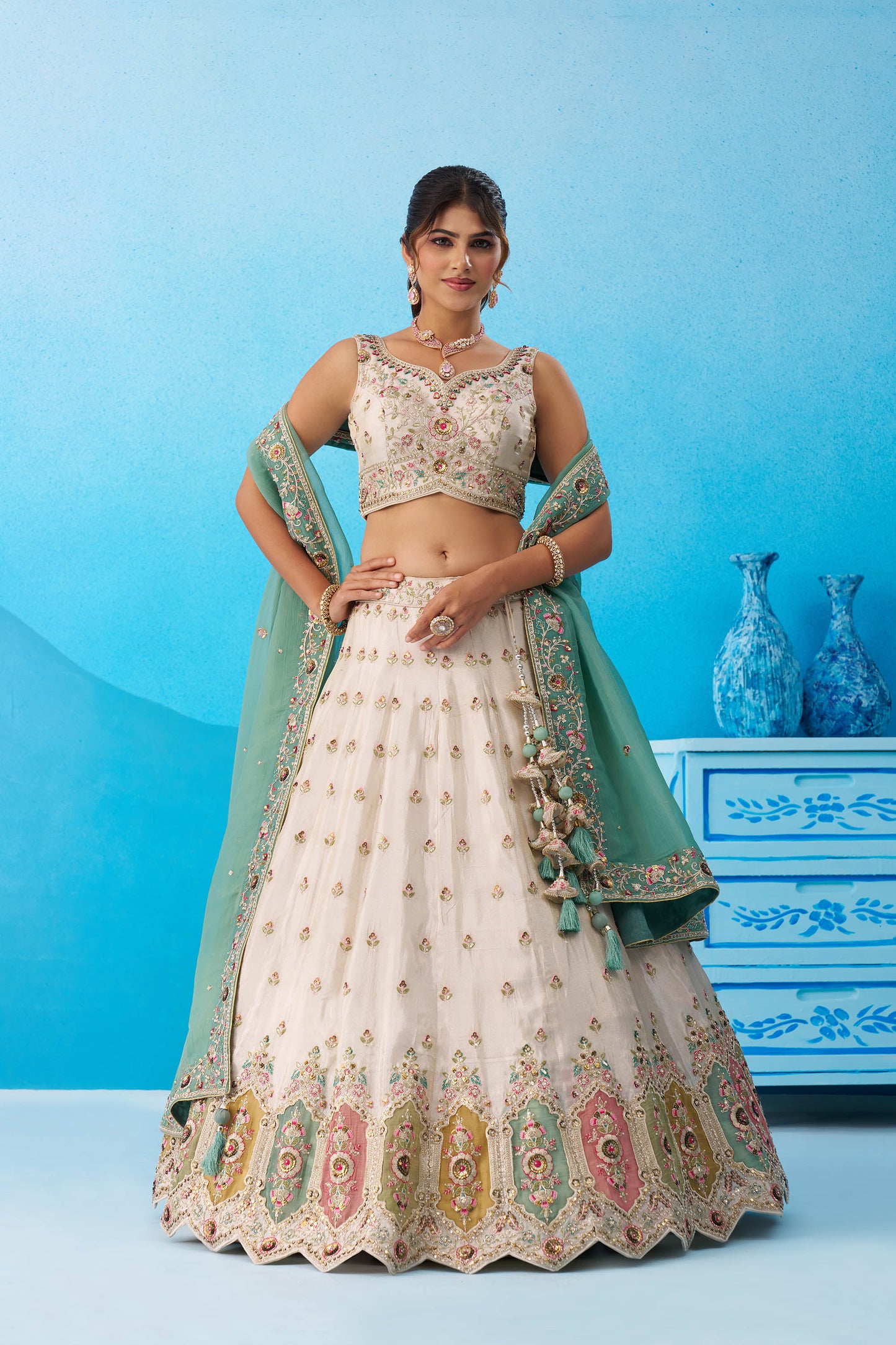 Cream & Sea Green Tissue Sequins Embroidered Lehenga Choli