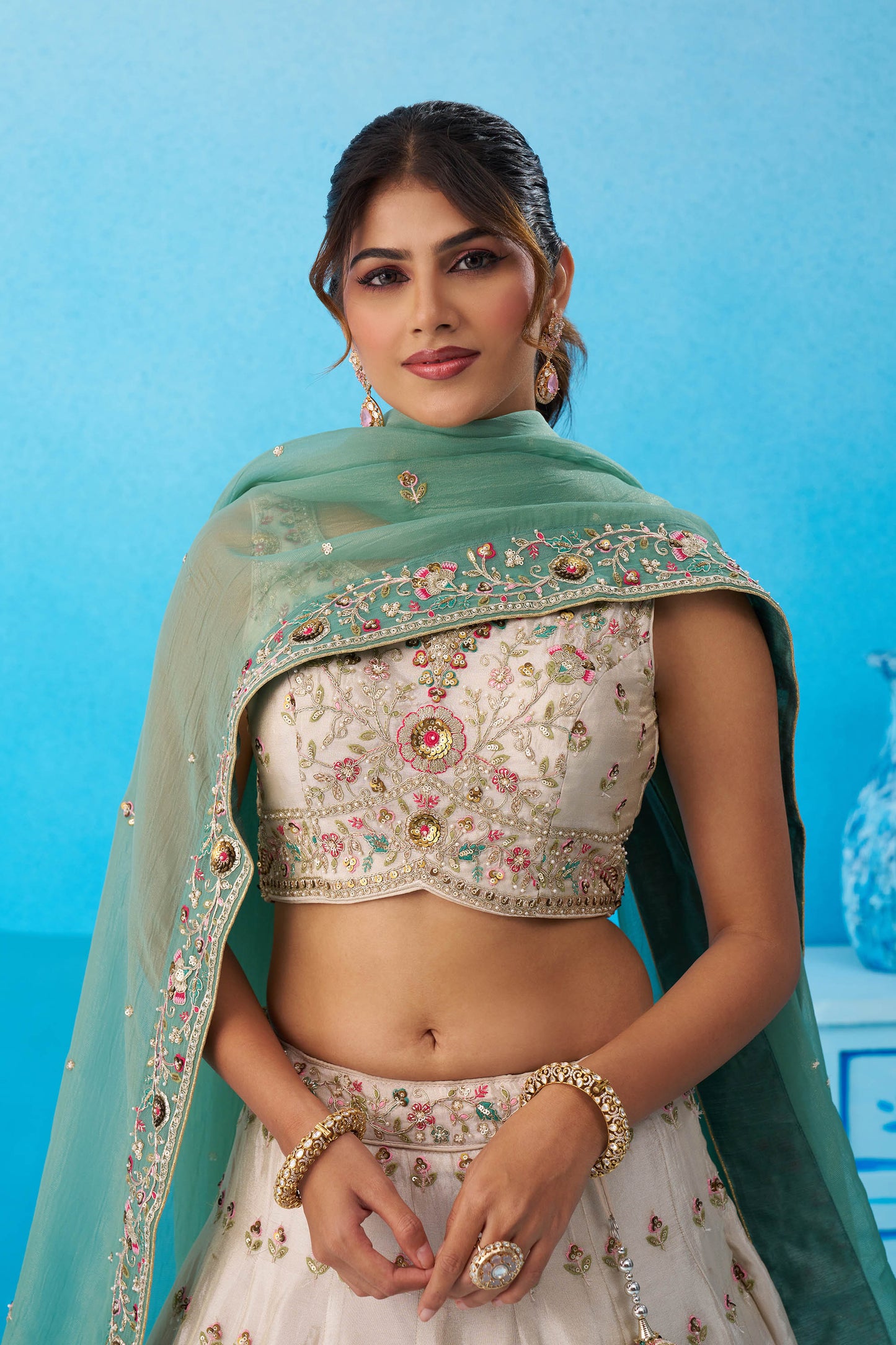 Cream & Sea Green Tissue Sequins Embroidered Lehenga Choli