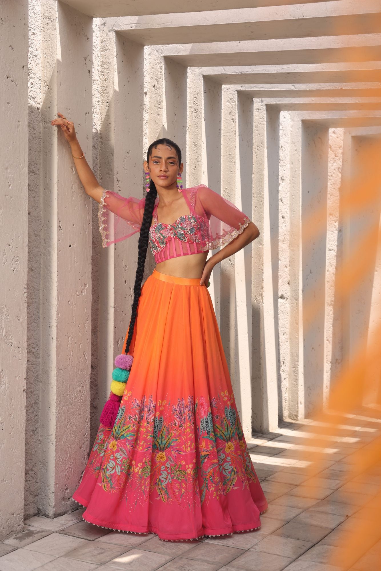 Double shaded Pink & orange floral printed skirt with beautifully hand embroidered corset and tulle cutwork cape