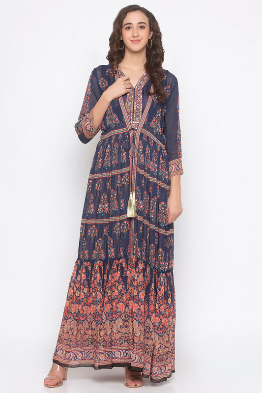 Layered Printed Jacket Paired With Contradt Crop Top And Pants.