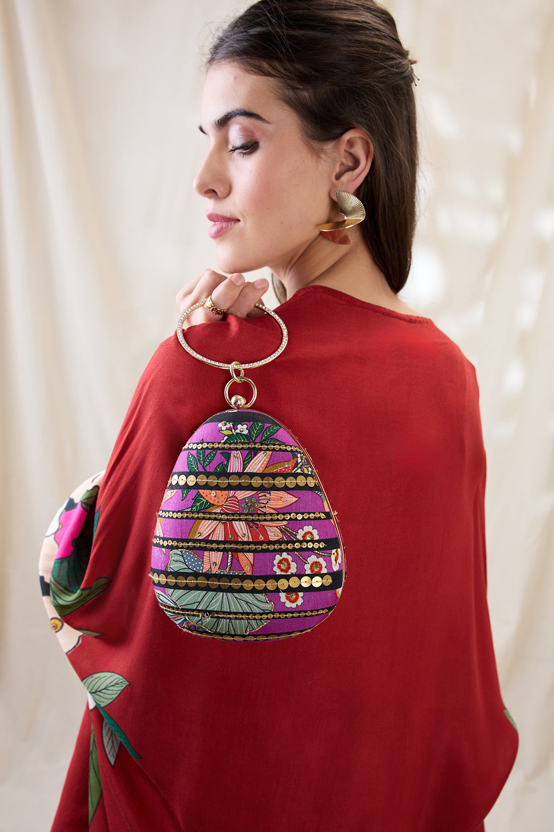 Aarani embellished clutch bag