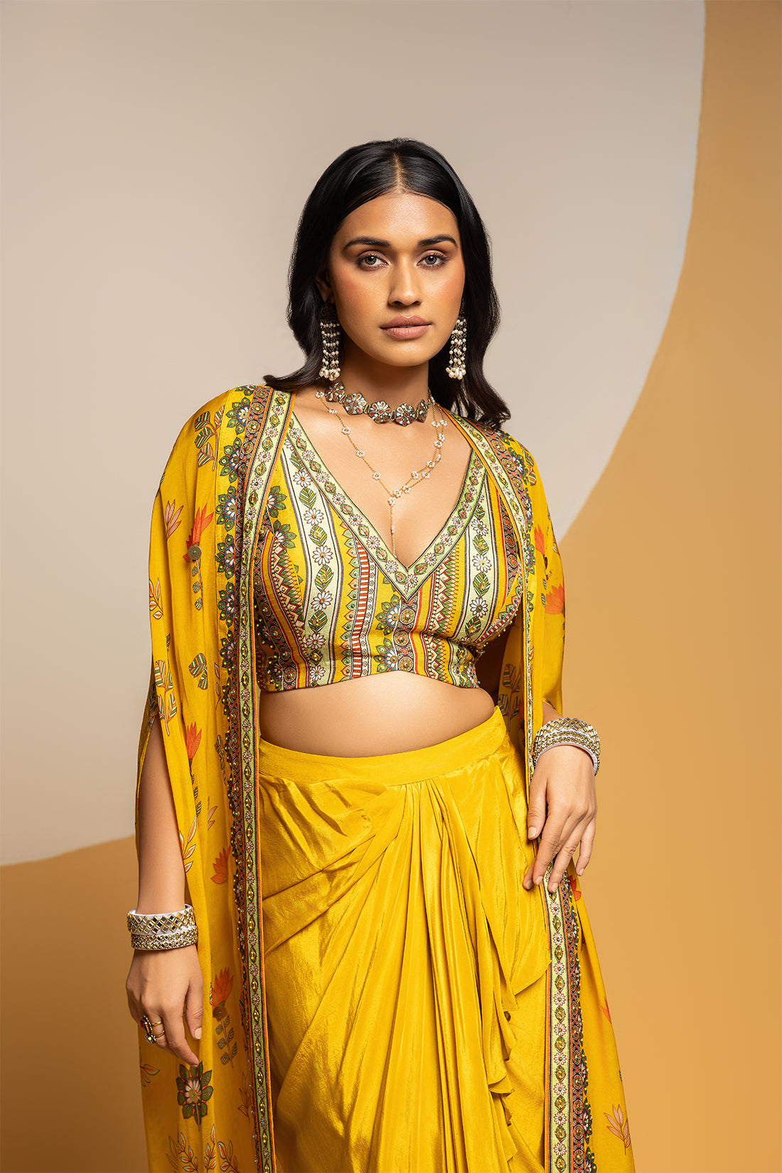 Taarani embellished  drape skirt  set with long cape