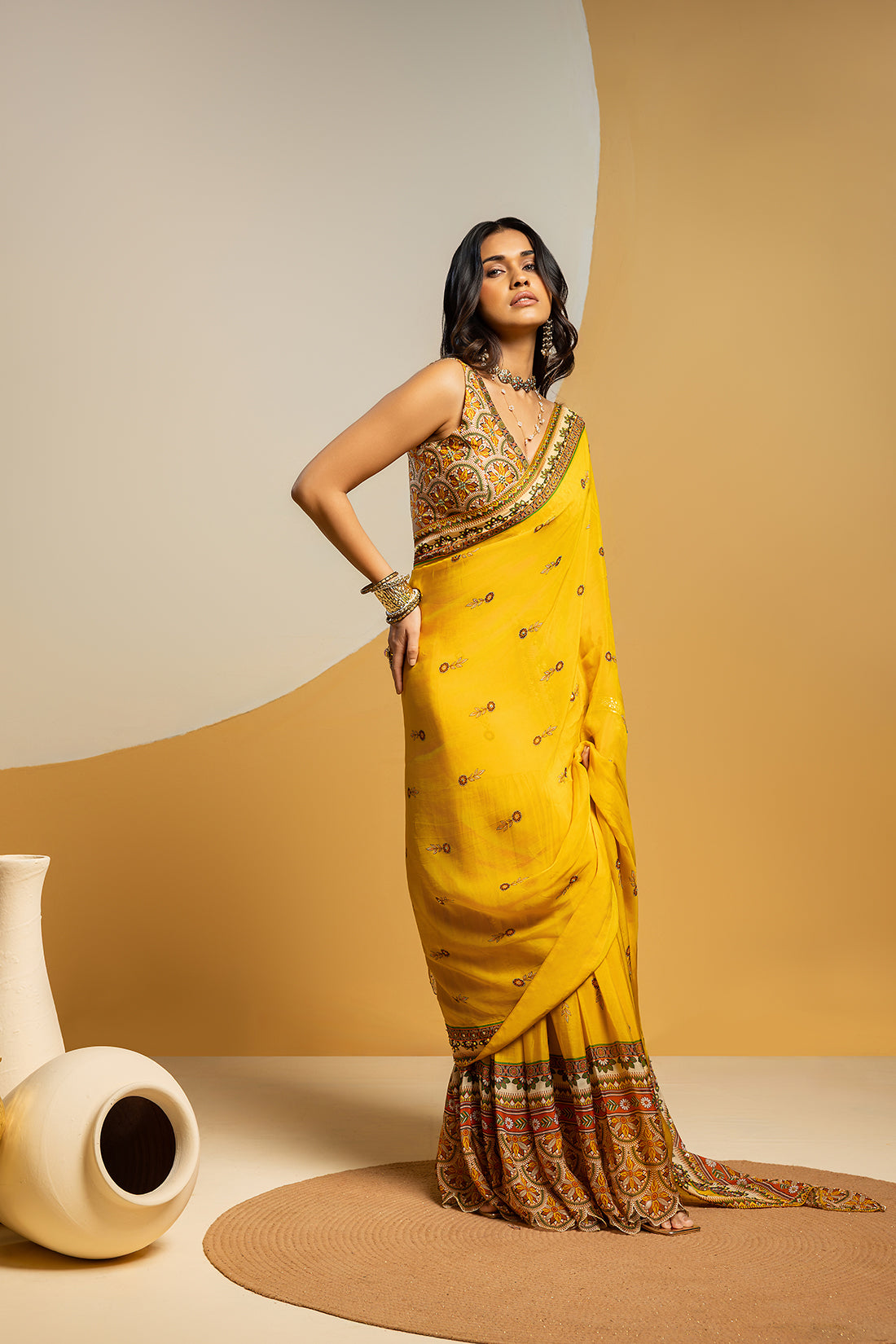Taarani embellished pre-stitched saree set
