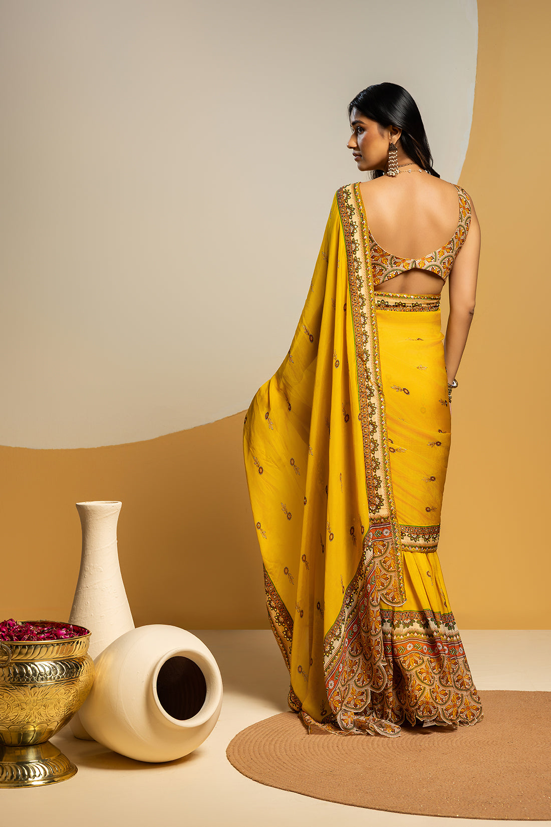 Taarani embellished pre-stitched saree set