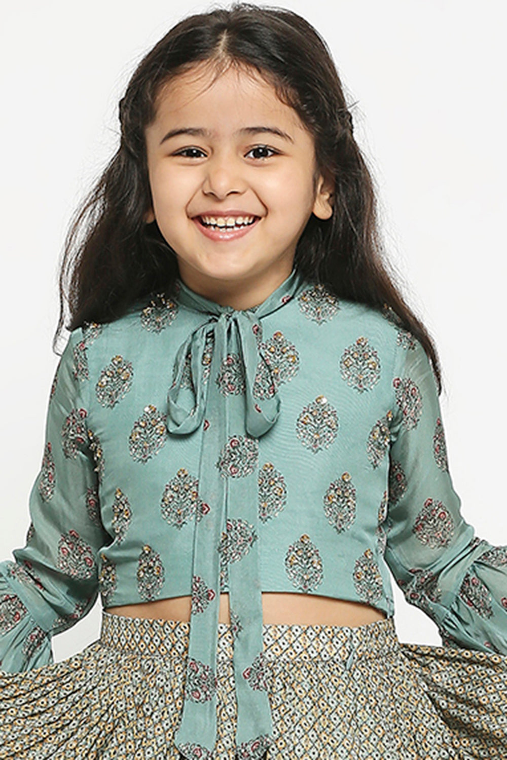 Muasir Printed Skirt Paired With Crop Top Which Has Bell Sleeves And Neck Tie Up