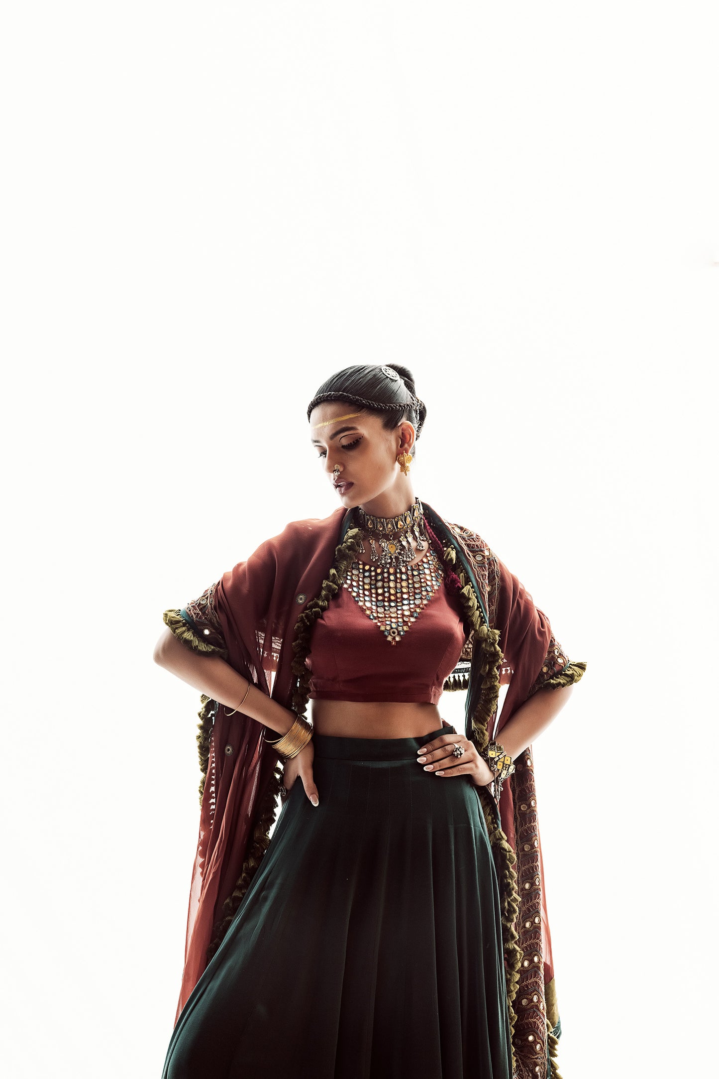 Teal lehenga with rust choli & hand embroidered dupatta