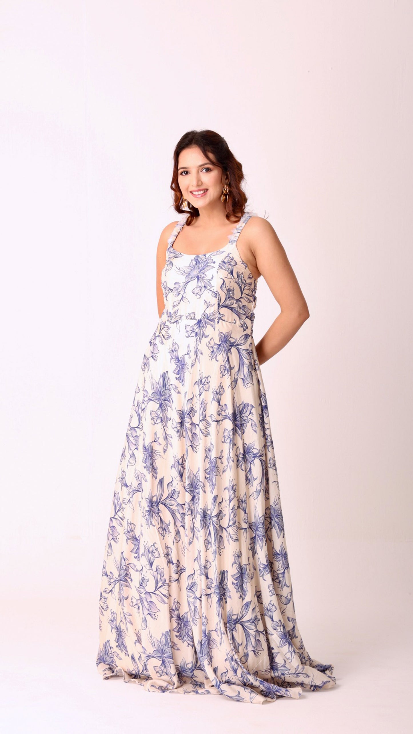 Graceful hand-embroidered ivory floral flare dress with soft blue blooms