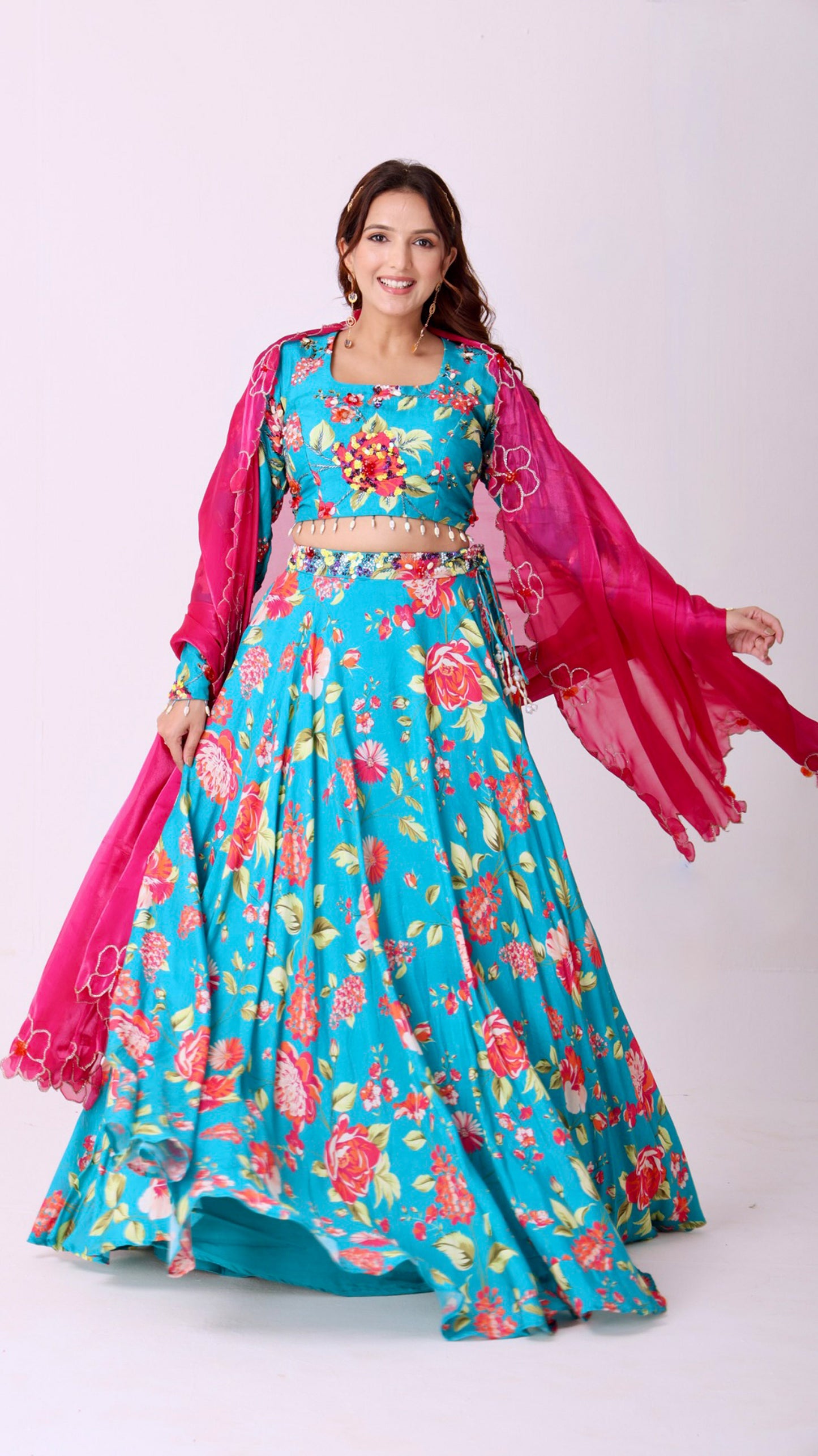 Floral hand- embroidered turquoise lehenga choli set with a contrasting dupatta