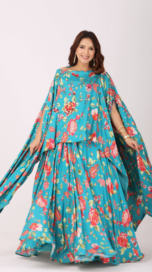 Turquoise floral kaftan kurti blouse paired with a matching flared lehenga