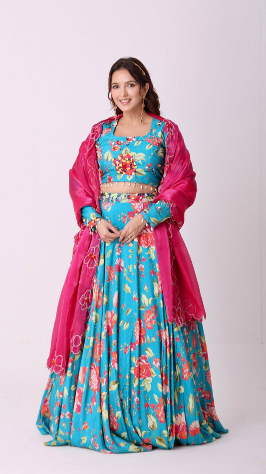 Floral hand- embroidered turquoise lehenga choli set with a contrasting dupatta