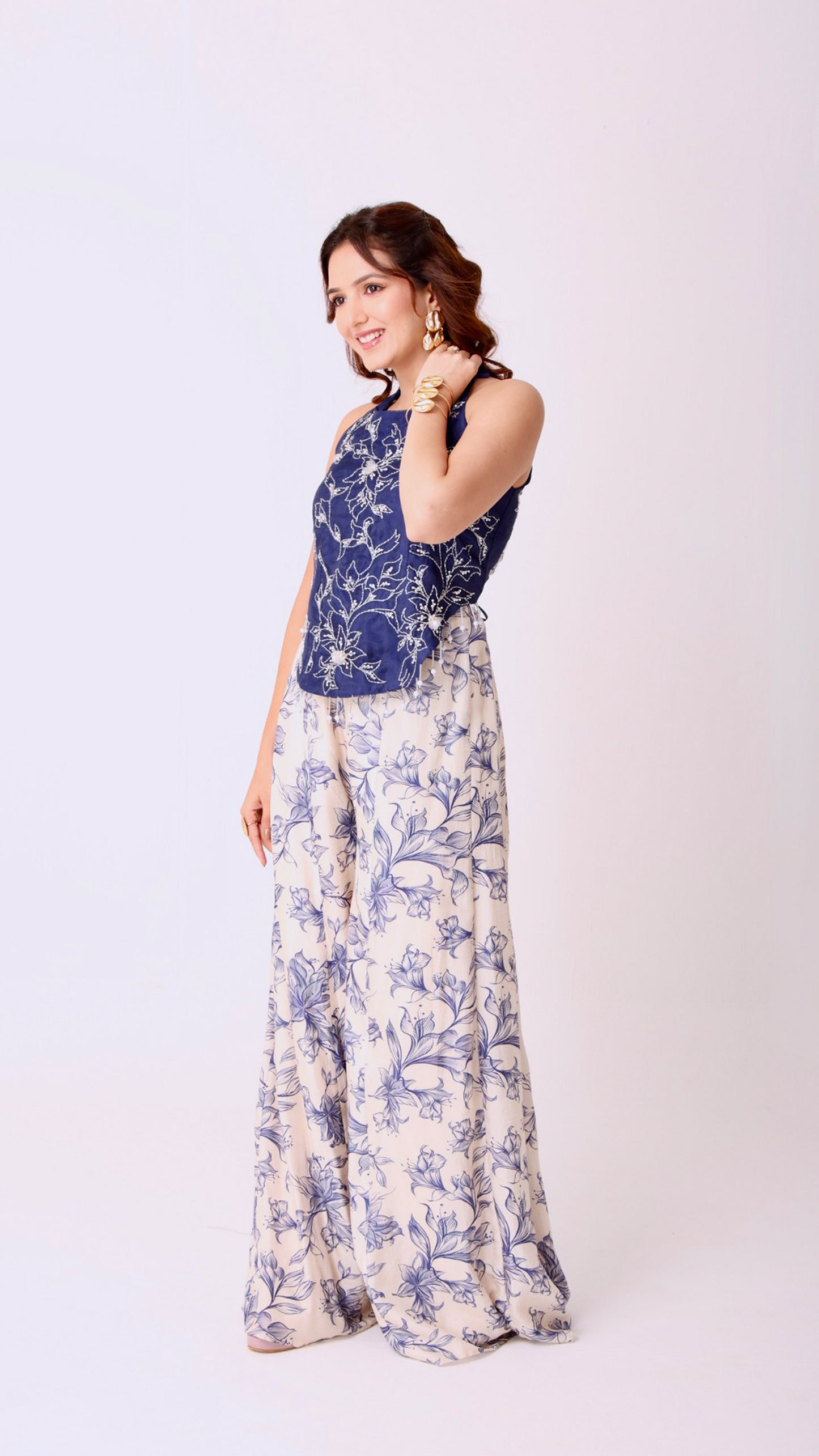 Navy organza hand-embroidered halter top with flowy ivory floral kali pants