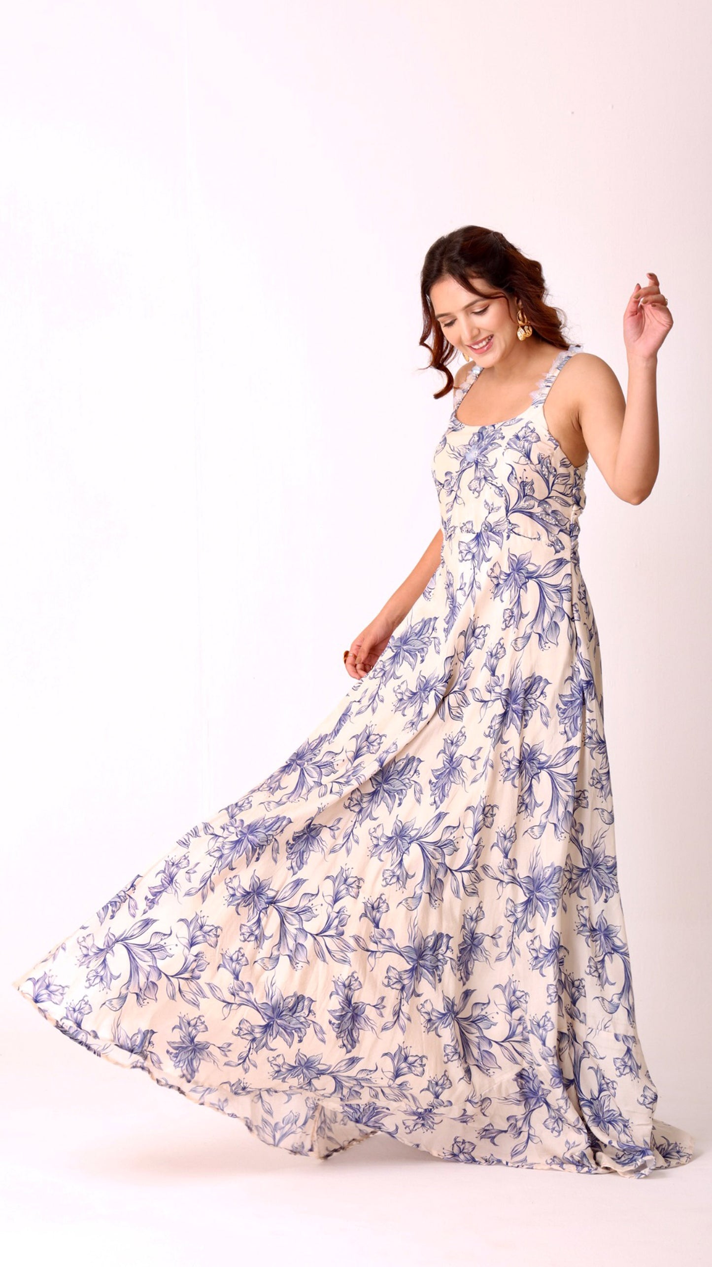 Graceful hand-embroidered ivory floral flare dress with soft blue blooms