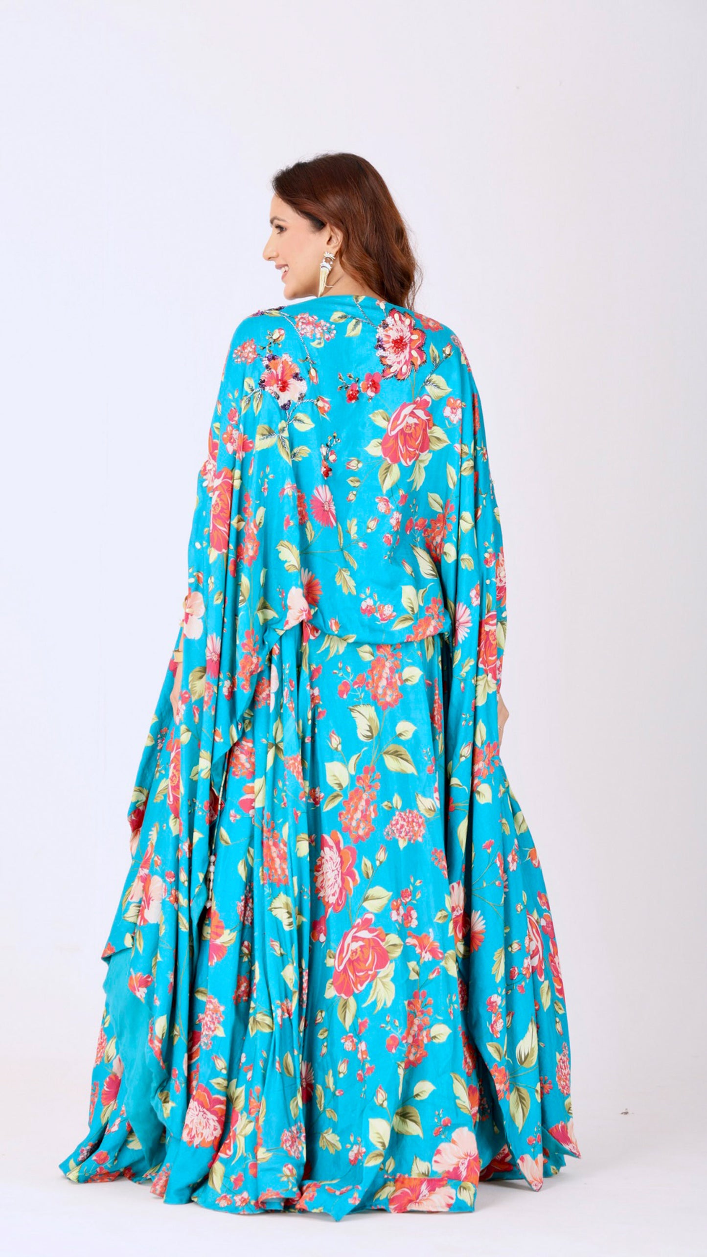 Turquoise floral kaftan kurti blouse paired with a matching flared lehenga