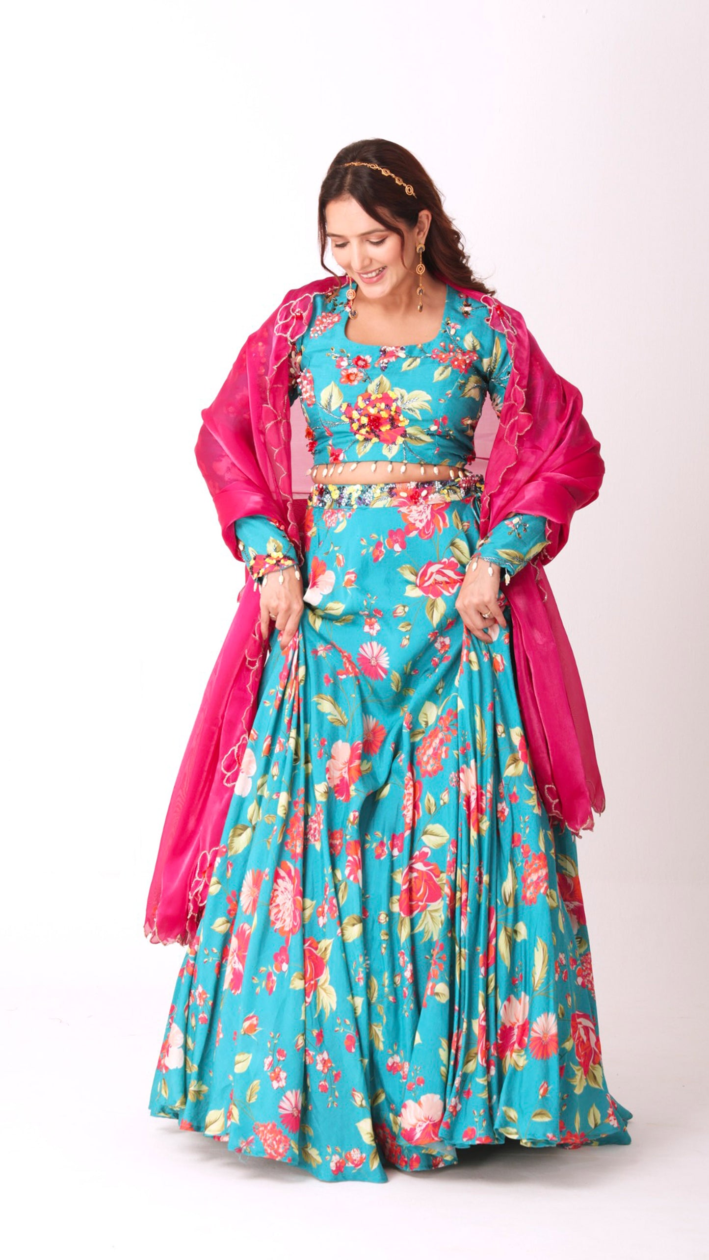 Floral hand- embroidered turquoise lehenga choli set with a contrasting dupatta