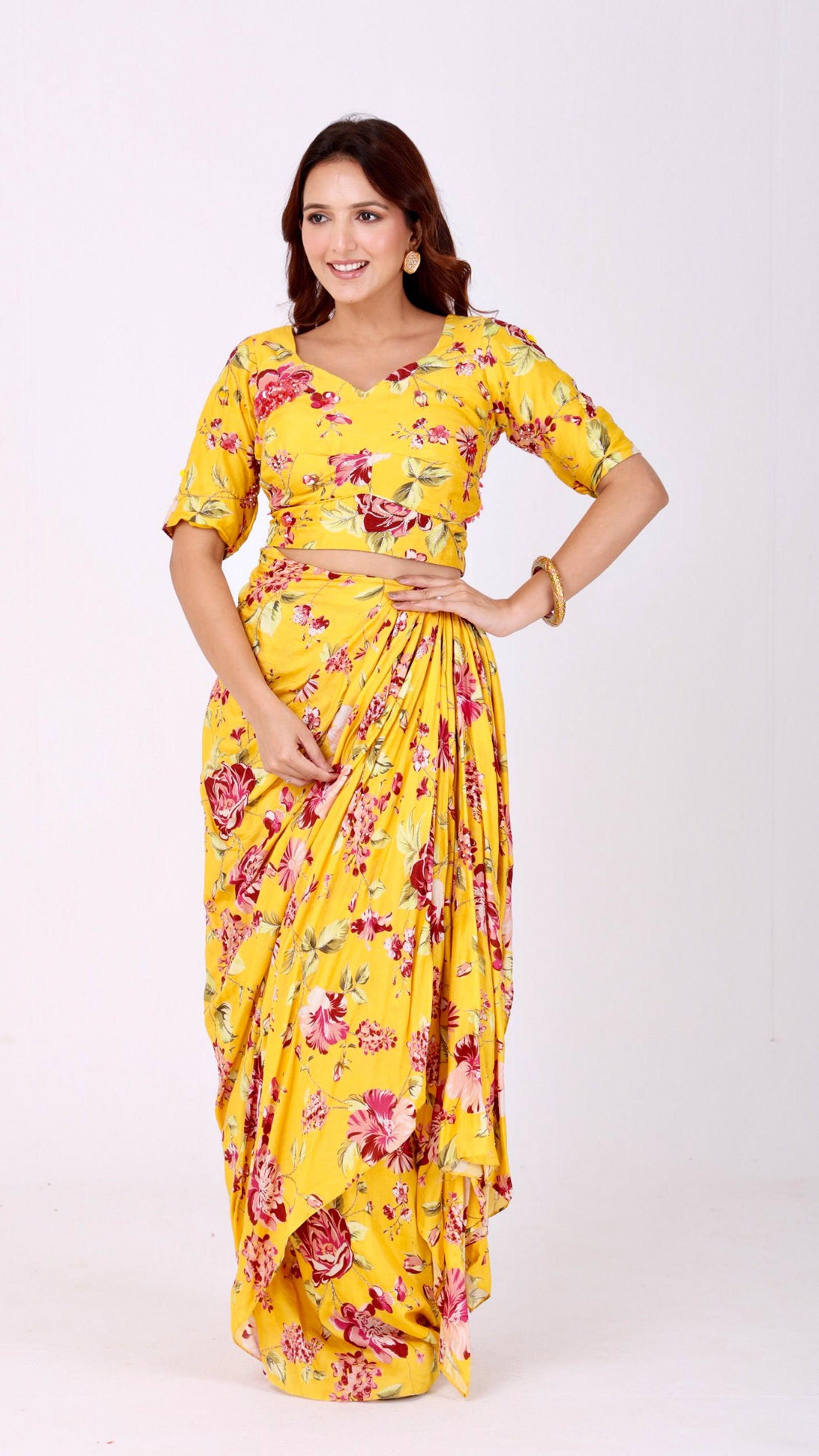 Sunflower yellow hand-embroidered floral drape skirt with a matching choli