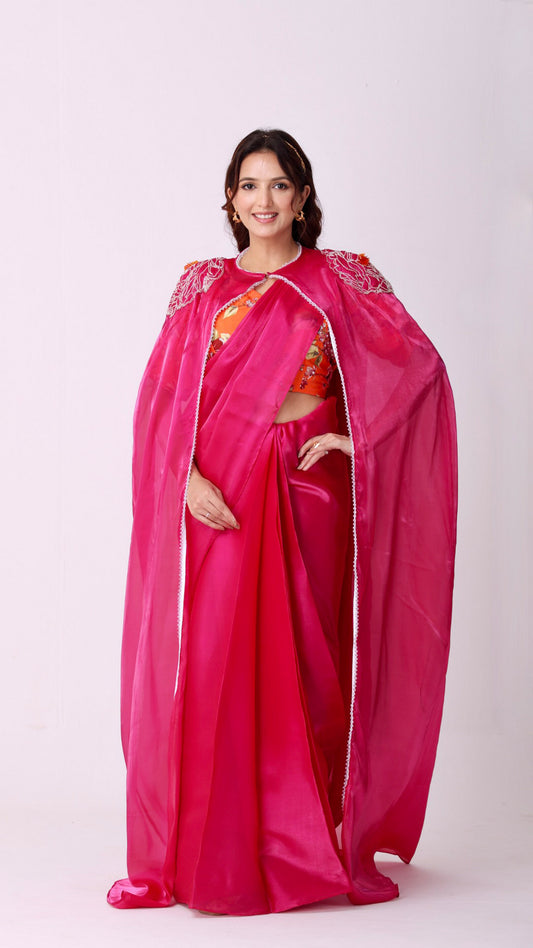 Fuchsia statement saree and embroidered cape with floral embellished blouse