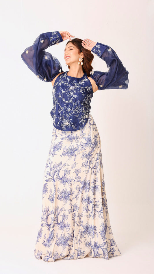 Embroidered navy halter top with dramatic puff sleeve & floral flair ivory skirt