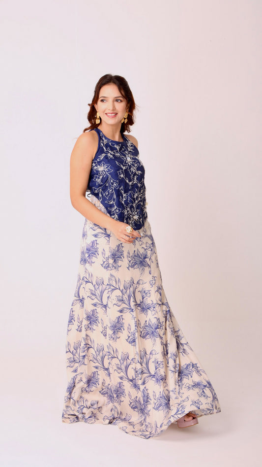 Navy hand-embroidered chic halter top paired with an ivory flared floral skirt