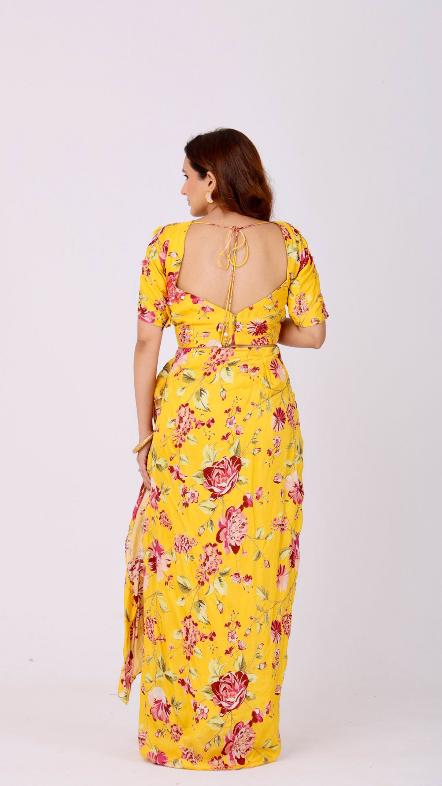 Sunflower yellow hand-embroidered floral drape skirt with a matching choli