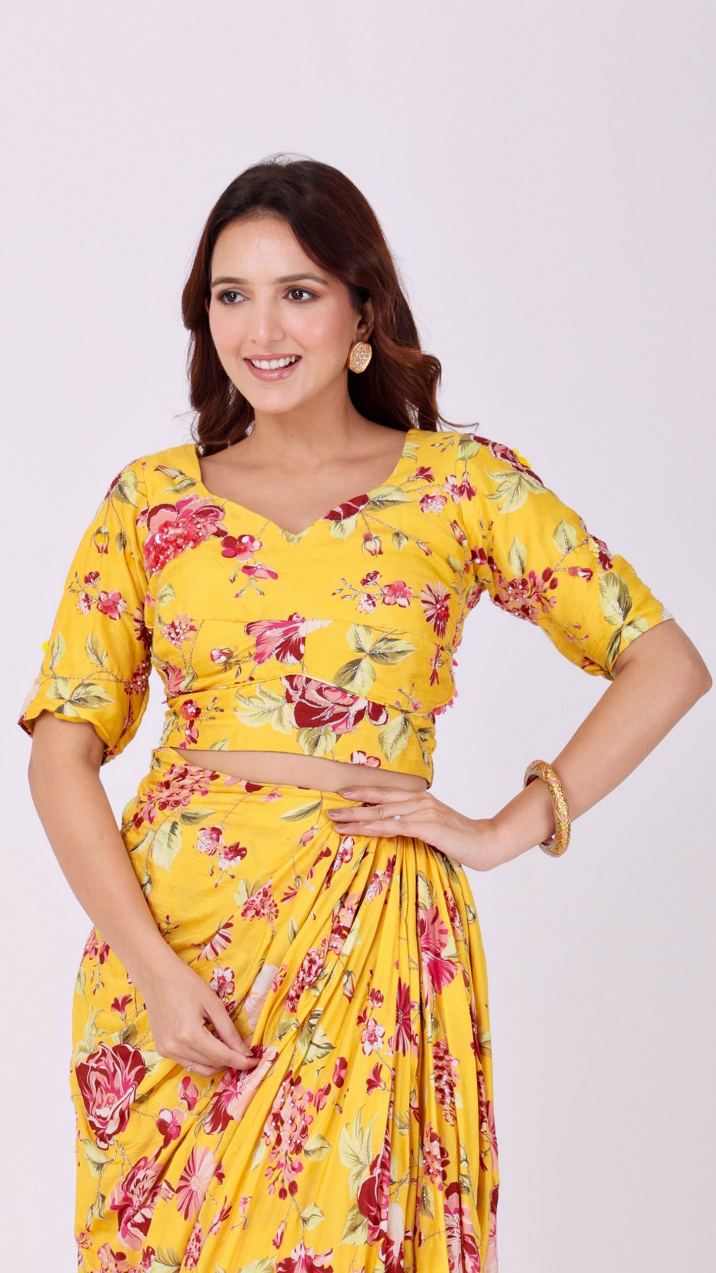 Sunflower yellow hand-embroidered floral drape skirt with a matching choli