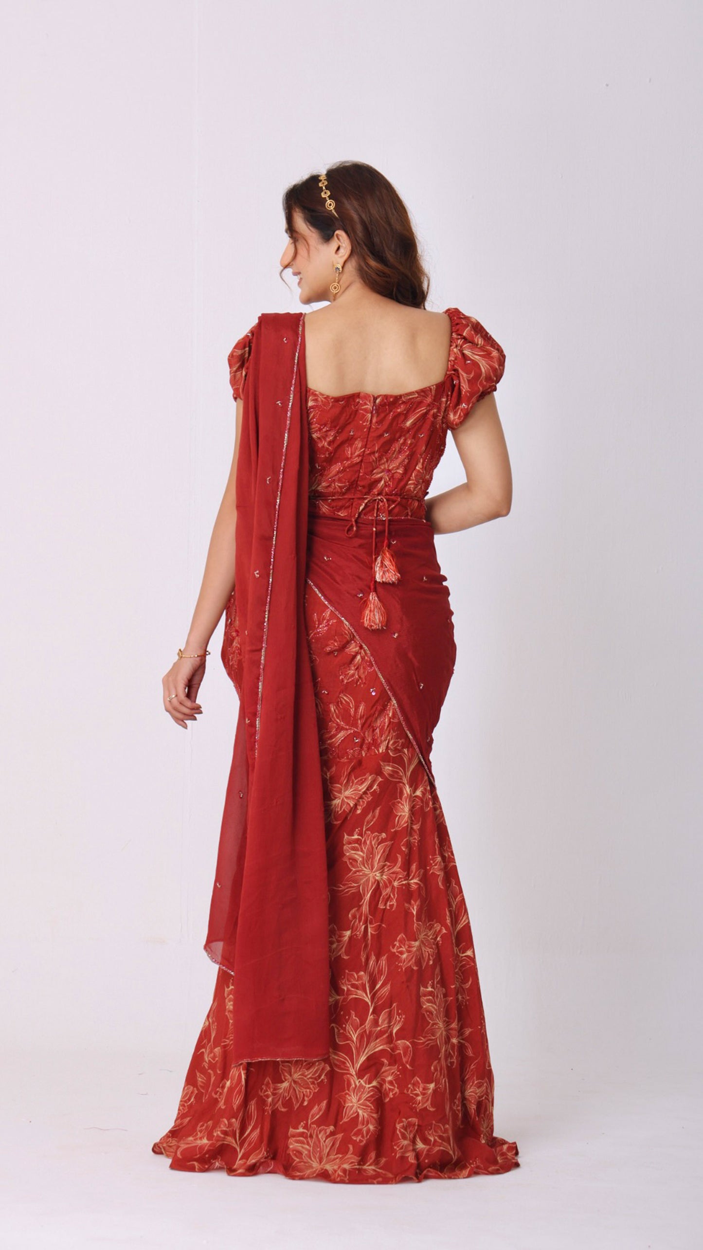 Maroon floral hand-embroidered fish-cut saree gown with puff sleeves and belt