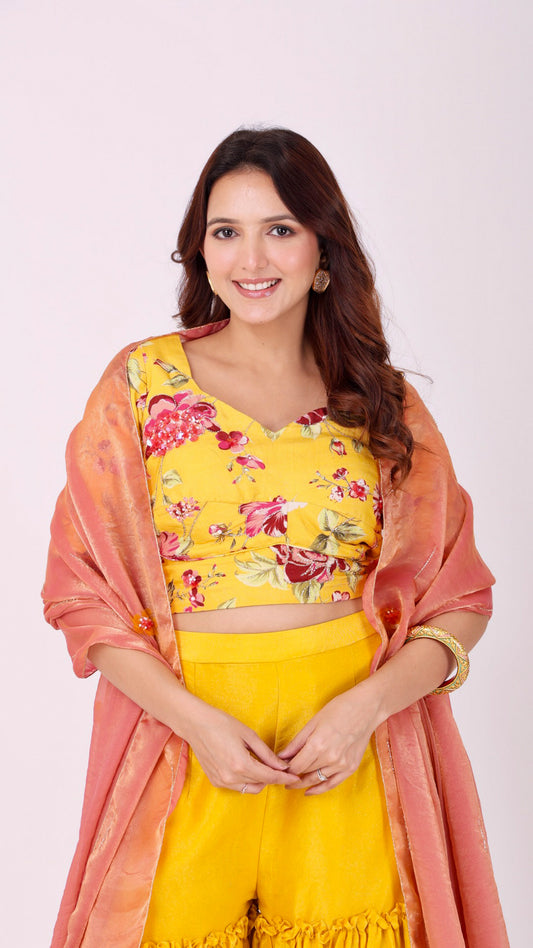 Yellow floral choli with sharara pants and organza dupatta