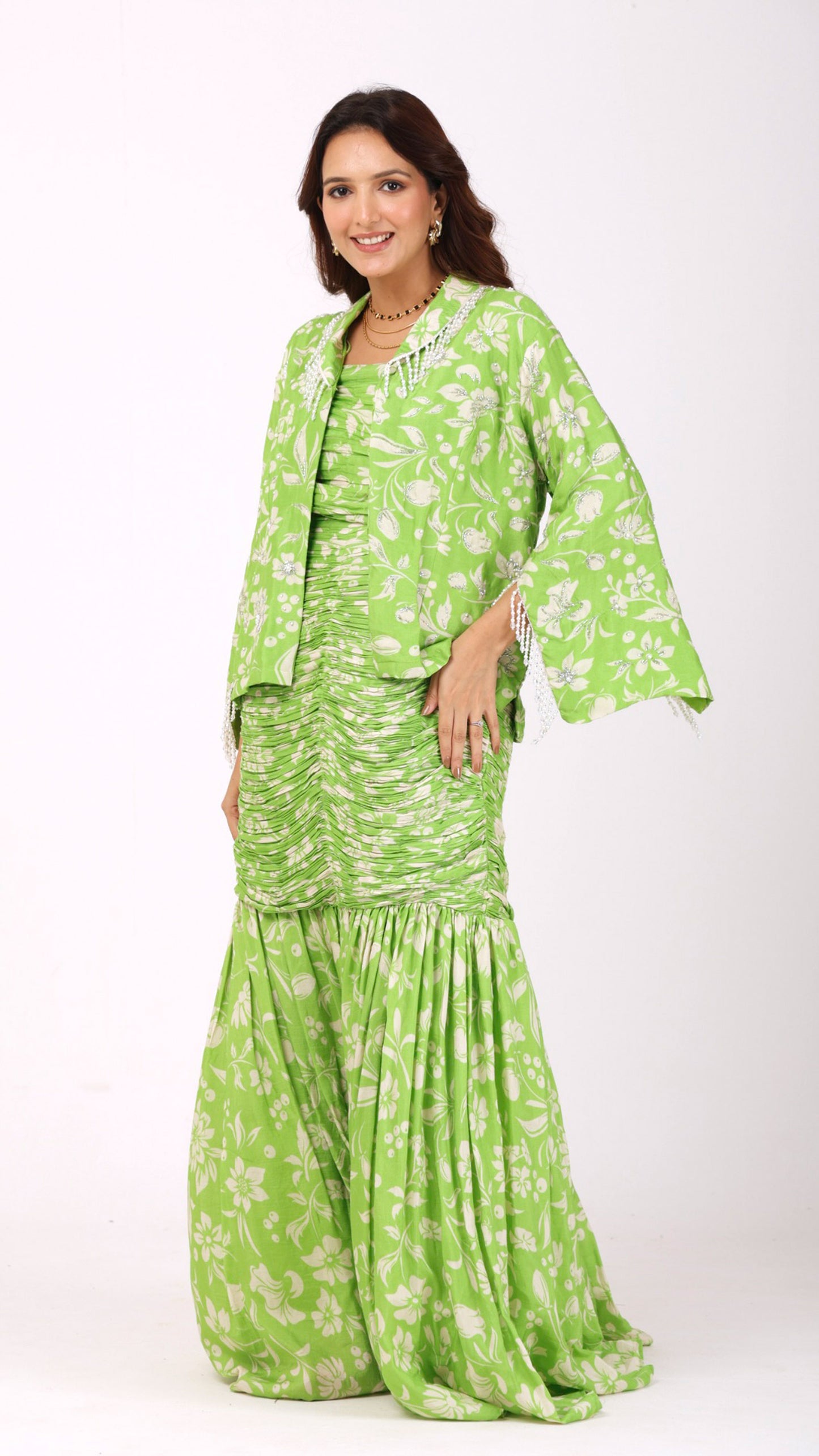 Love Bird Green Floral fish-cut ruched skirt and choli set paired with a hand-embroidered jacket