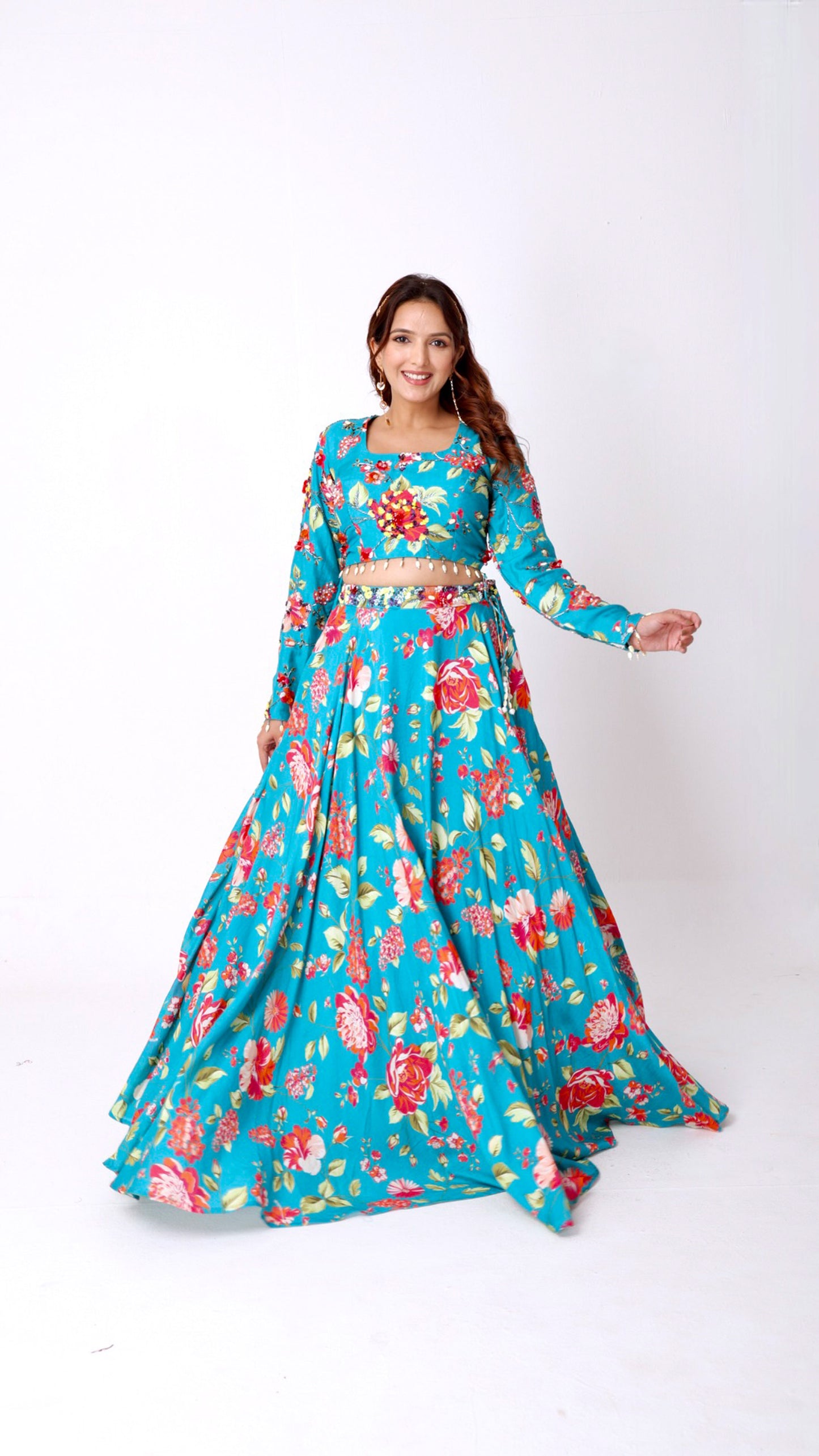 Vibrant floral embroidered turquoise blue skirt & choli set with back tie-up