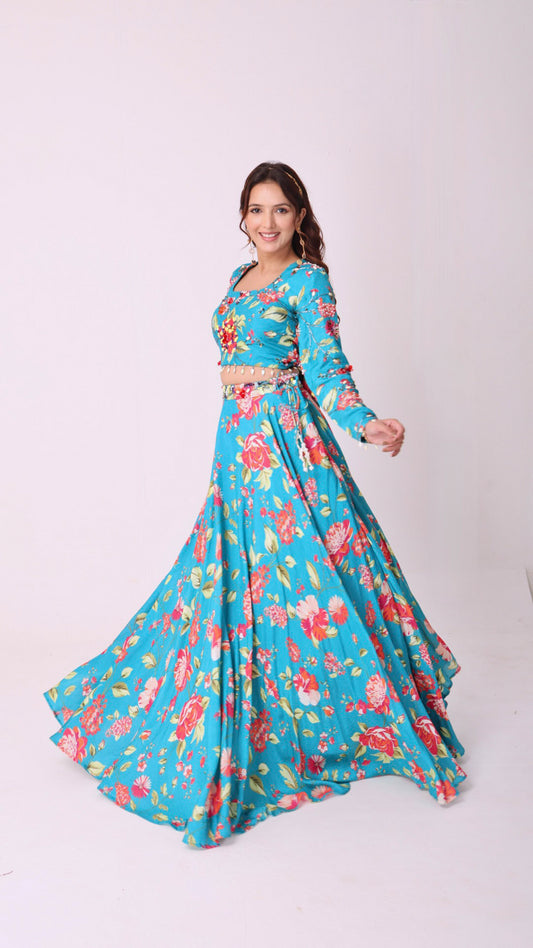 Vibrant floral embroidered turquoise blue skirt & choli set with back tie-up
