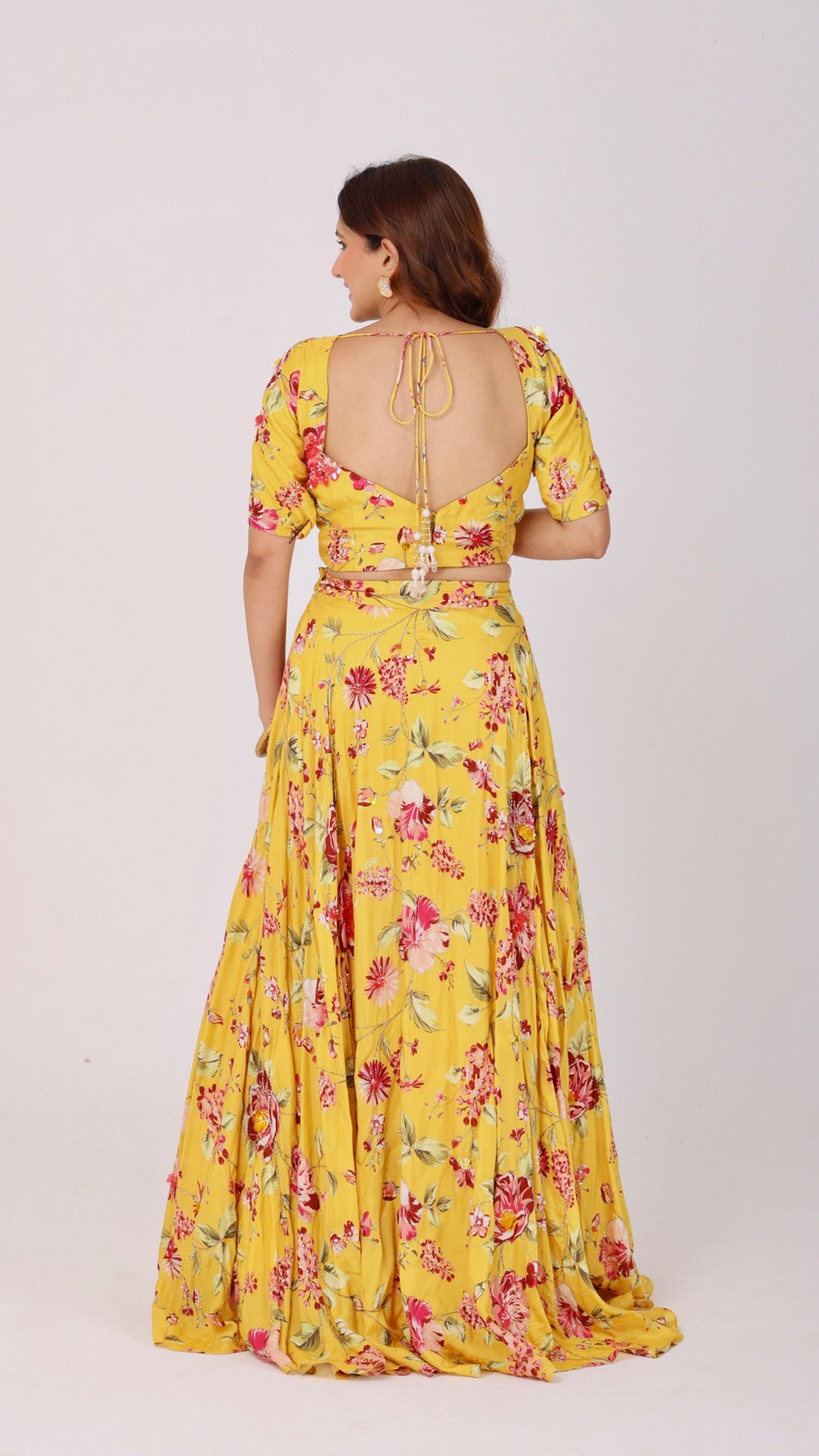 Yellow floral silk lehenga set with organza dupatta