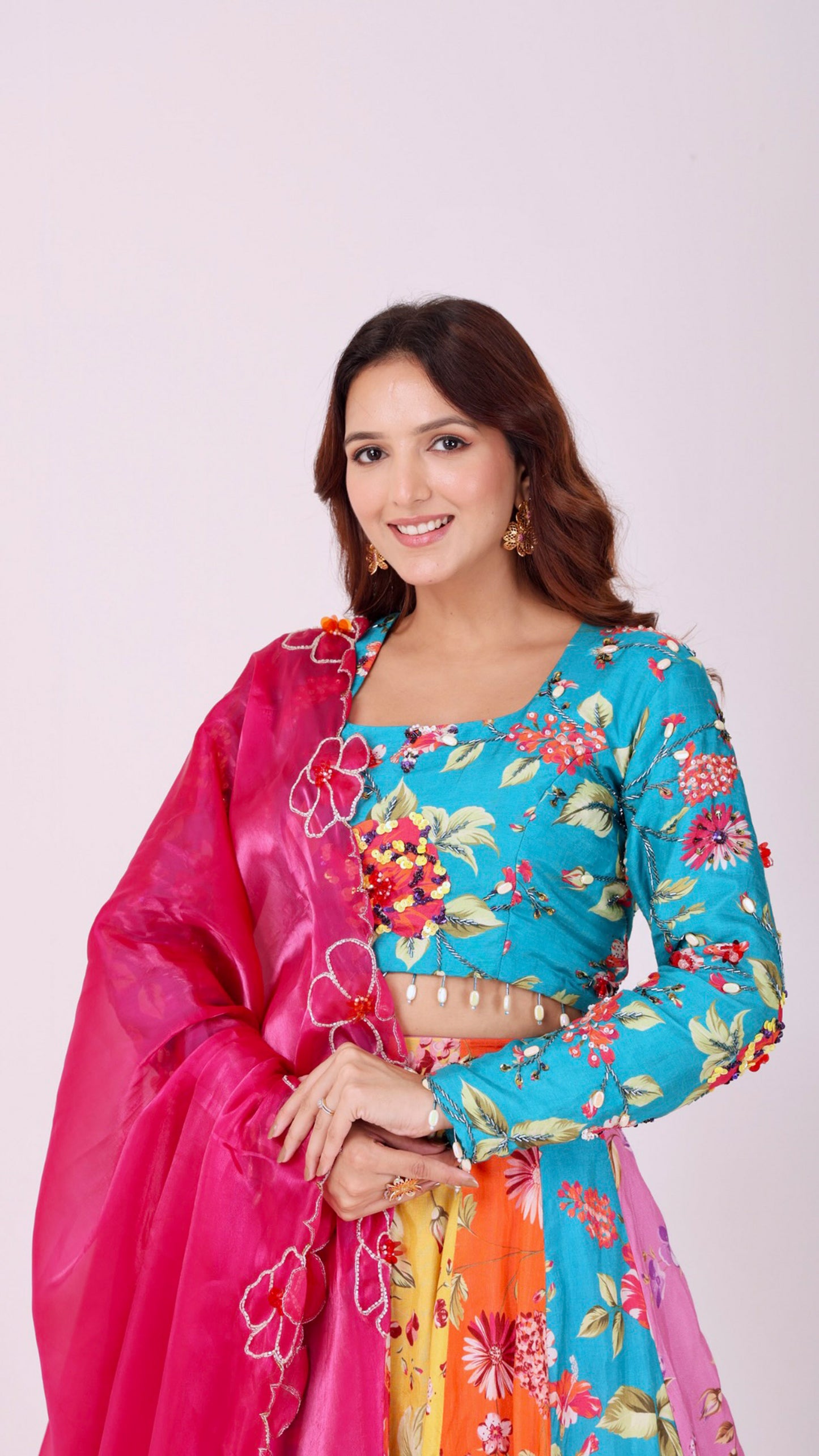 Orangeade Vibrant multi-colour floral kali lehenga with embroidered blouse & dupatta