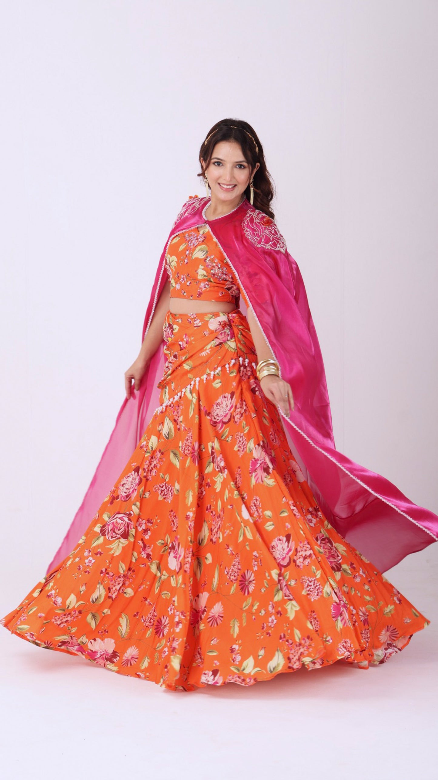 Orangeade hand-embroidered floral lehenga set with cape